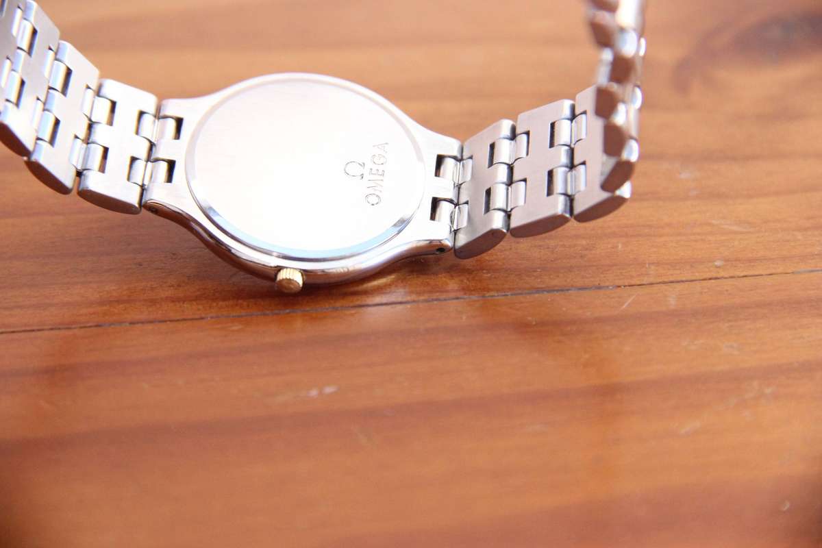 RARE OMEGA DEVILLE QUARTZ 'SYMBOL' WATCH - STAINLESS STEEL & 18K GOLD BEZEL