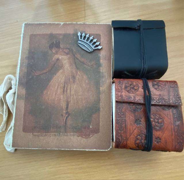 THREE VERY OLD NOTE BOOKS