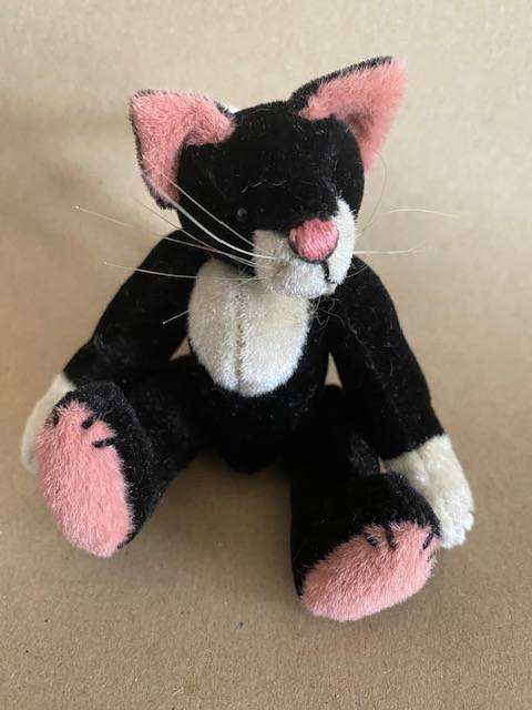 SMALL ARTIST SYLVESTER CAT