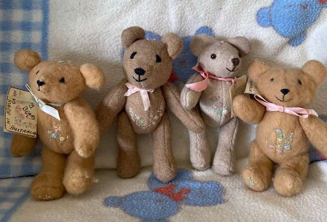 FOUR VINTAGE EMBROIDERED ARTIST TEDDIES