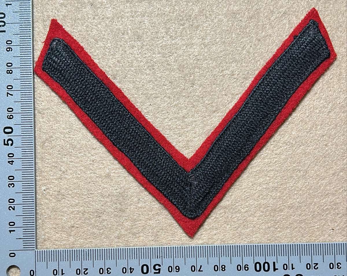 RHODESIA REGIMENT - LANCE CORPORAL SLEEVE RANK ON RED
