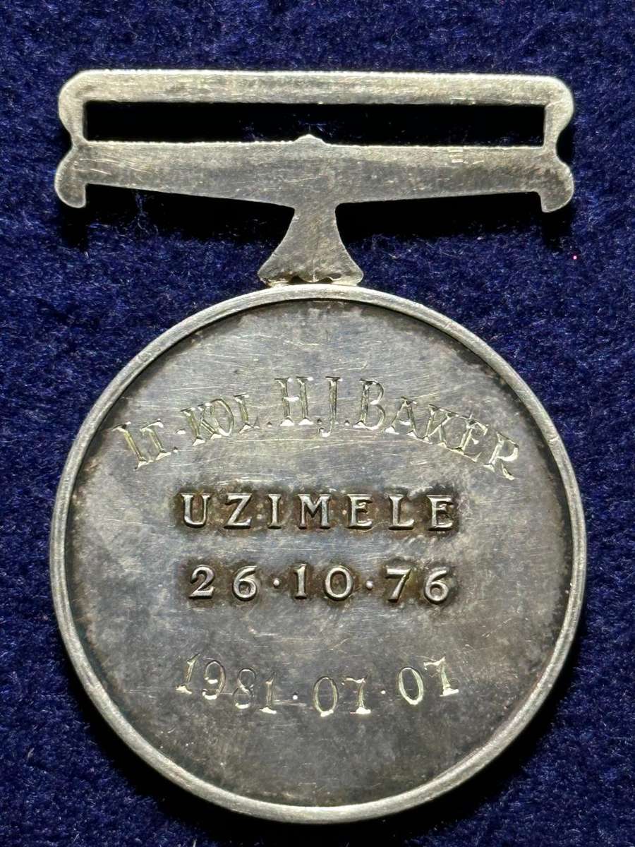 SA Military Decorations & Medals - Transkei 30 Years Service Medal - FS, Named Lt. Kol Baker - 1981