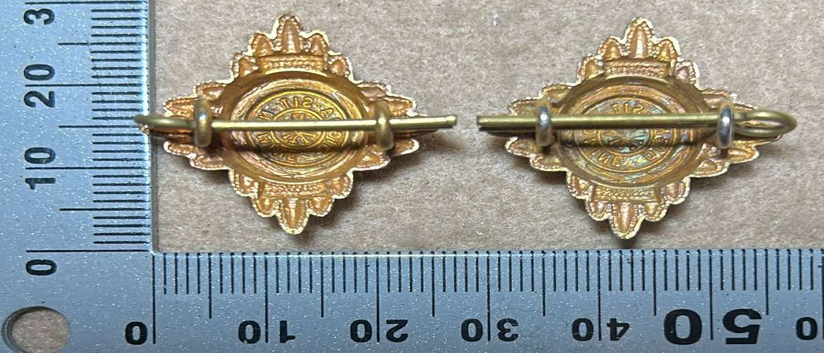 RHODESIA CROWNS AND PIPS - 2 BRASS PIPS WITH RED ENAMEL