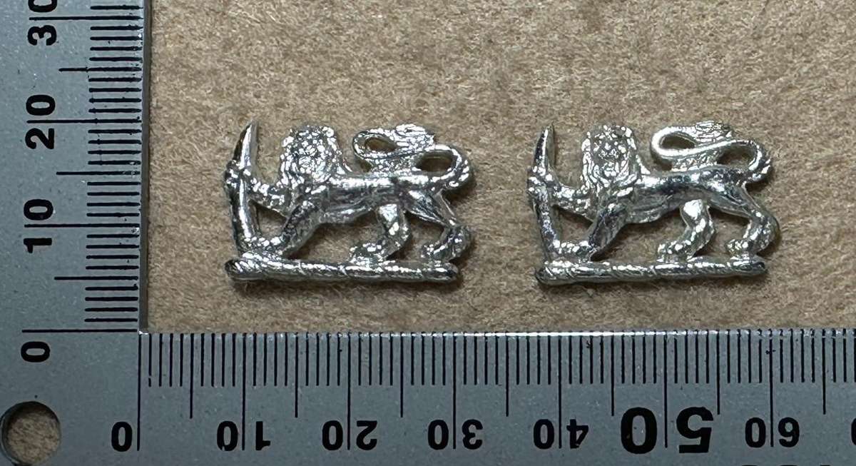 RHODESIA CROWNS AND PIPS - 2 ANNODISED CHROME LIONS