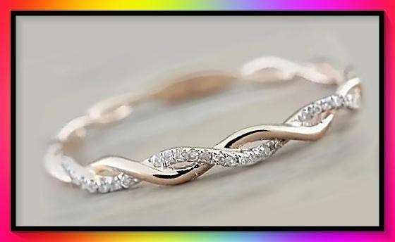 Lovely petite twined design rose ring size 8