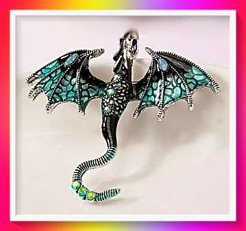 Amazing green and silver flying dragon brooch