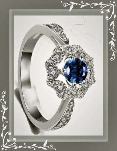 Exquisite, simulated sapphire and faux zircon ring S7