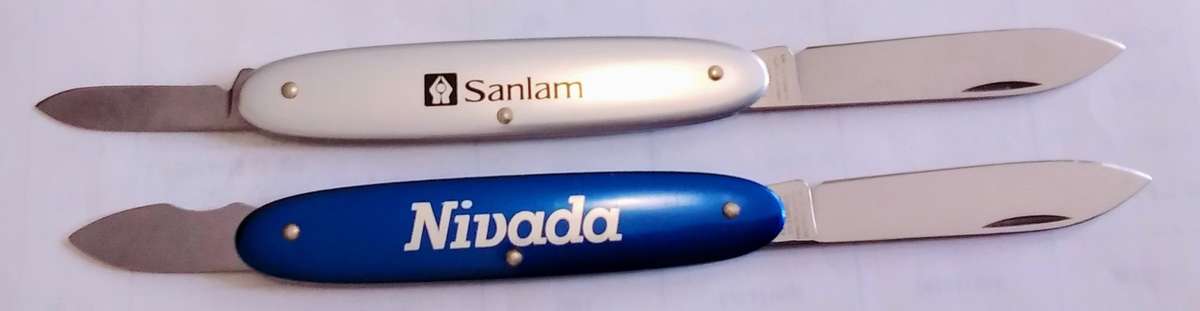 2 Vintage promo Victorinox Switzerland stainless pocket knives.