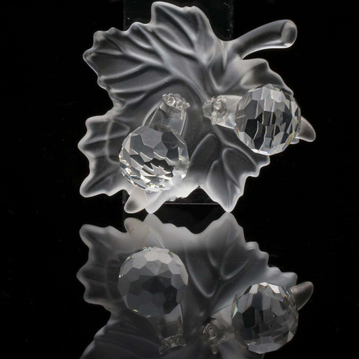 Swarovski Crystal Baby Snails on a Vine Leaf Among Flowers and Foliage