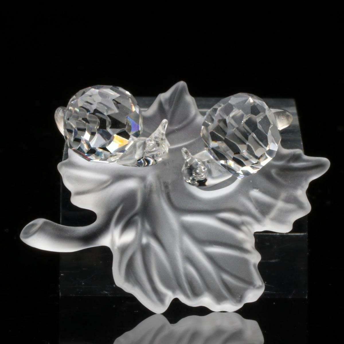 Swarovski Crystal Baby Snails on a Vine Leaf Among Flowers and Foliage