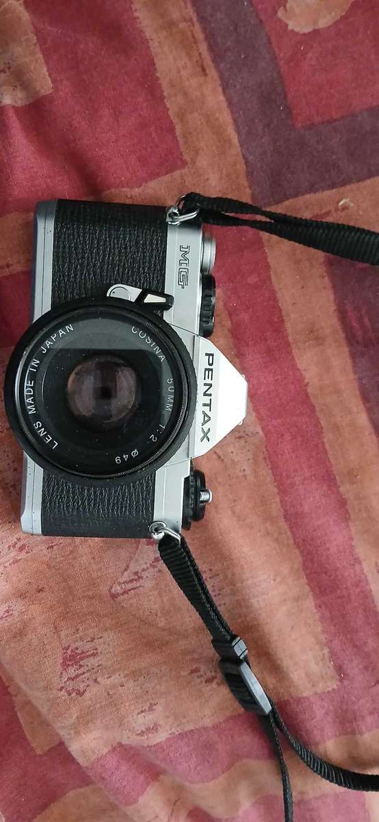 Vintage Pentax MG 35mm Film SLR Camera with Cosina 50mm lens
