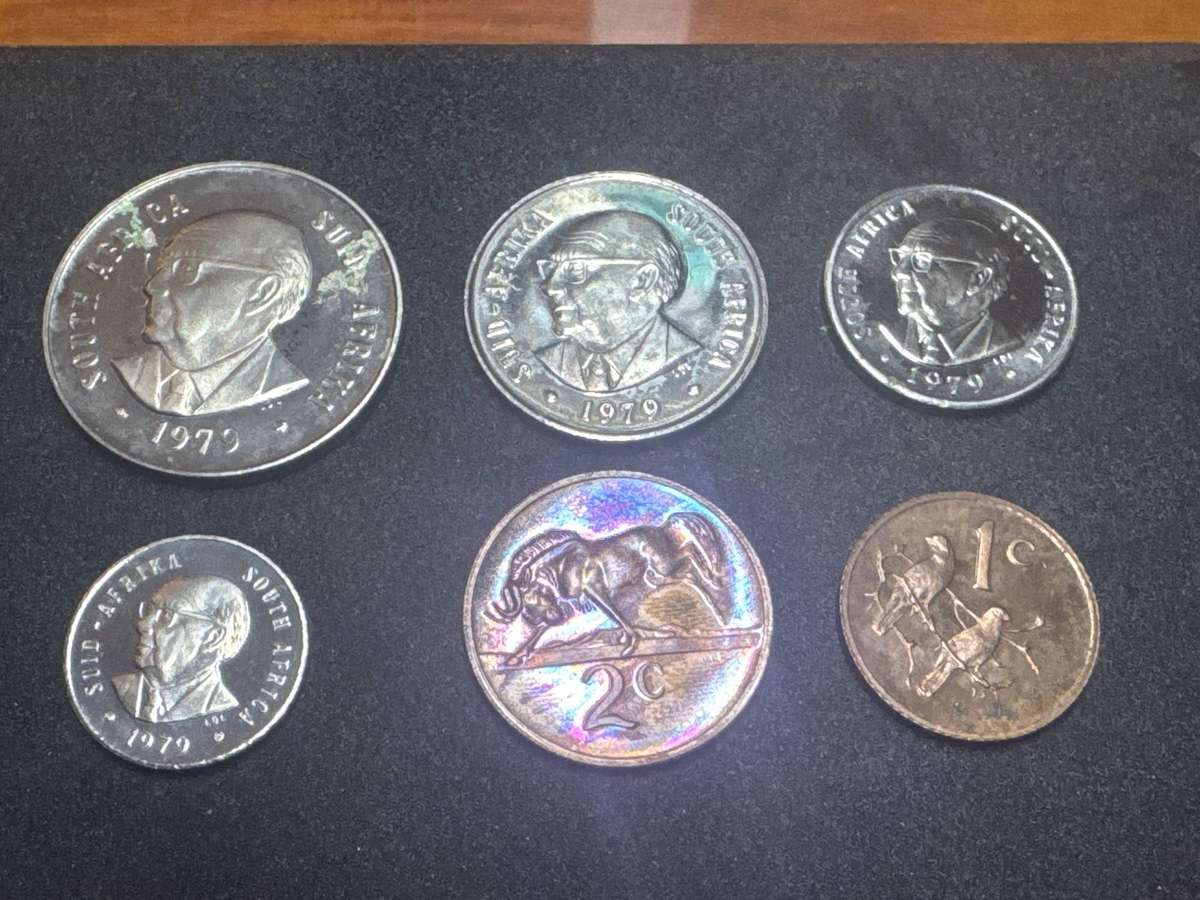 1979 South African 50c to 1c, proof, coin has oxidized and has rust spots.