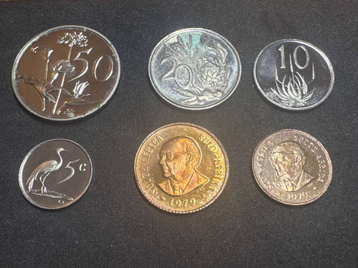 1979 South African 50c to 1c, proof, coin has oxidized and has rust spots.