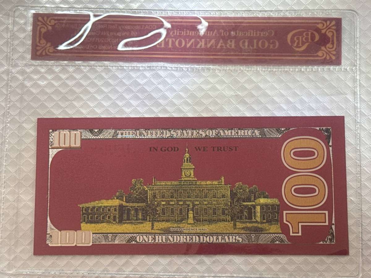 Red gold foil version: $100. Plastic replica.