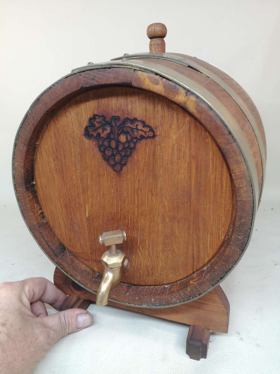 A Stunning Vintage Large solid Oak 10 Liter wine barrel with brass hoops, tap & stand