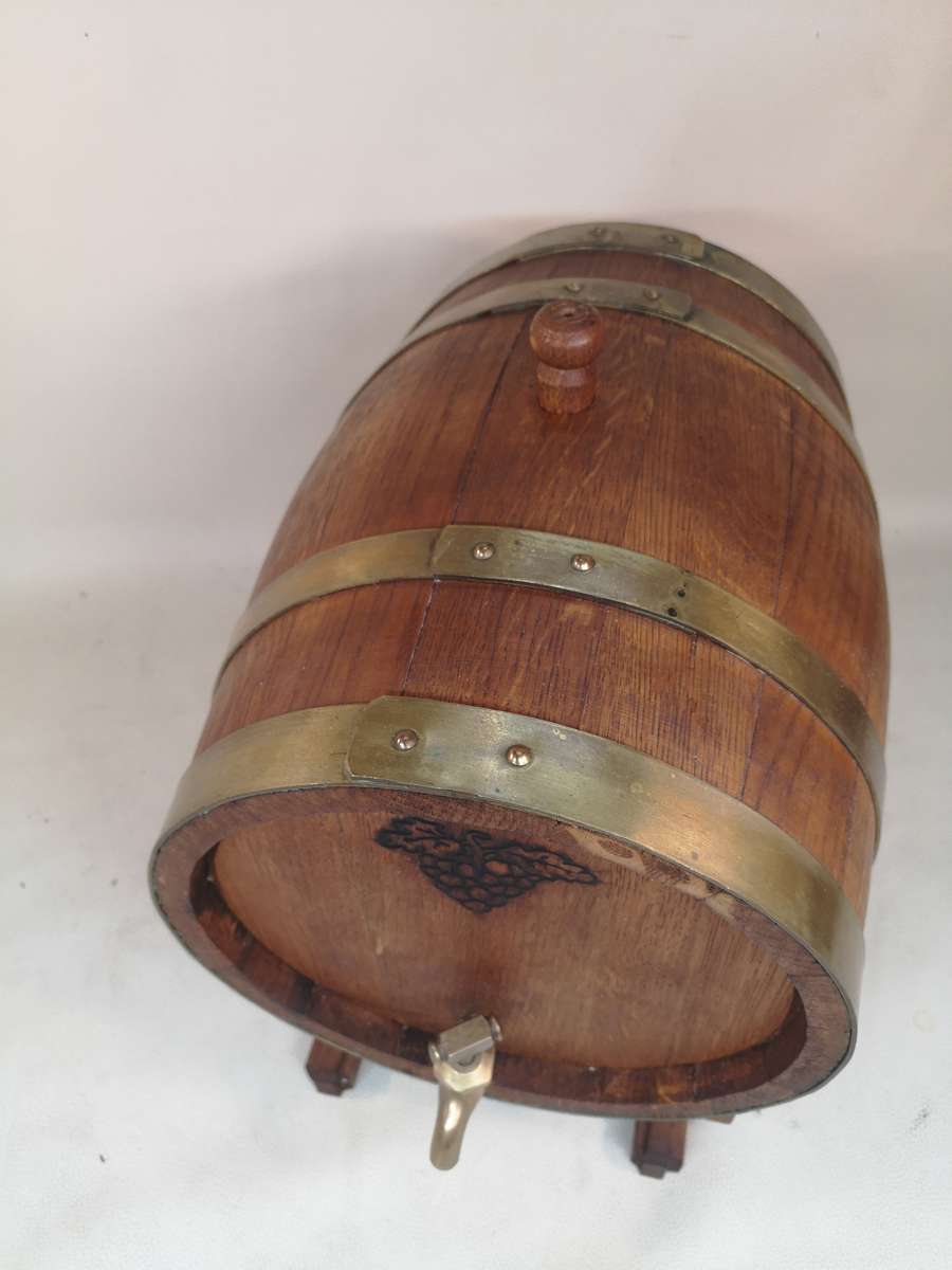 A Stunning Vintage Large solid Oak 10 Liter wine barrel with brass hoops, tap & stand