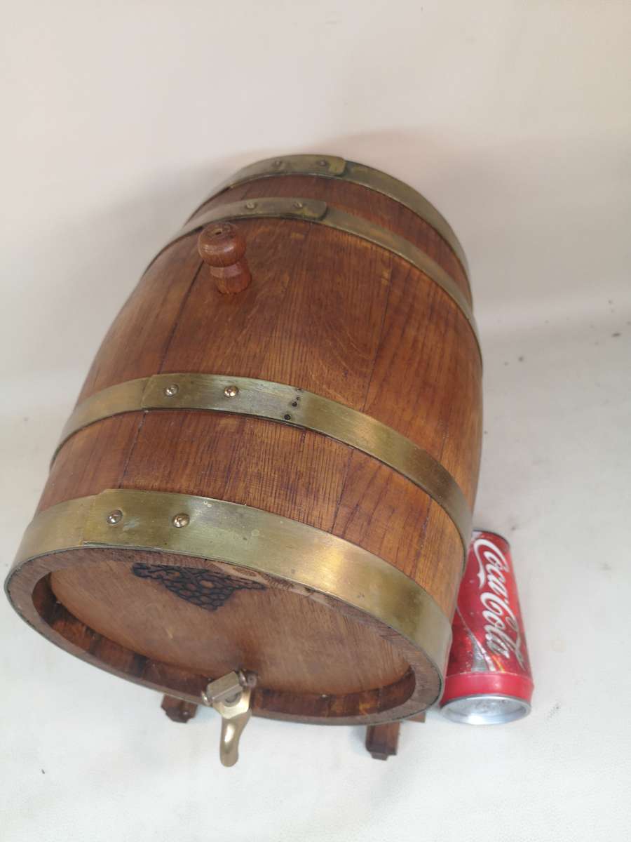 A Stunning Vintage Large solid Oak 10 Liter wine barrel with brass hoops, tap & stand