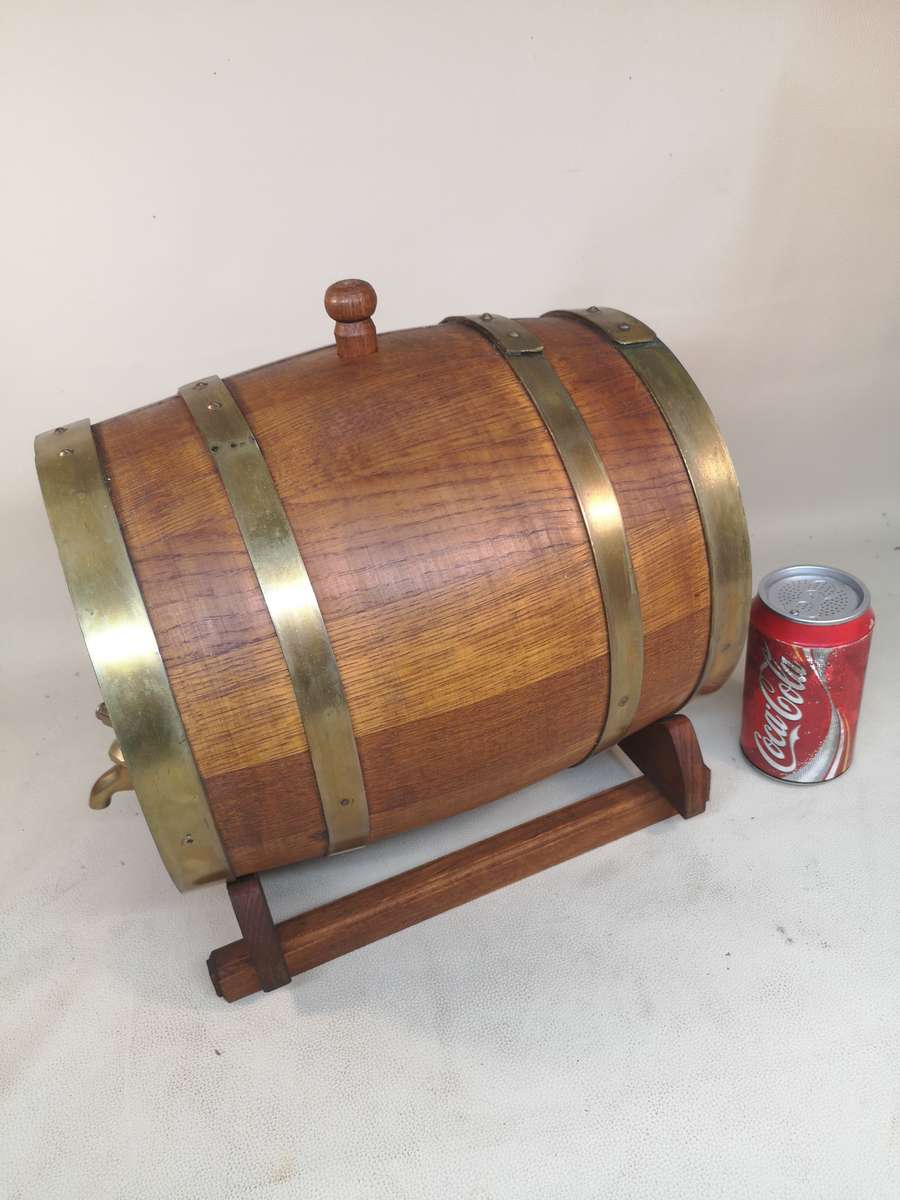 A Stunning Vintage Large solid Oak 10 Liter wine barrel with brass hoops, tap & stand