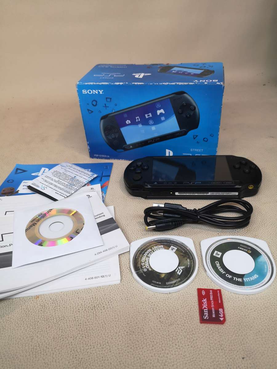 Sony psp sreet (Psp - E1004) charcoal black console with original packaging and games bundle