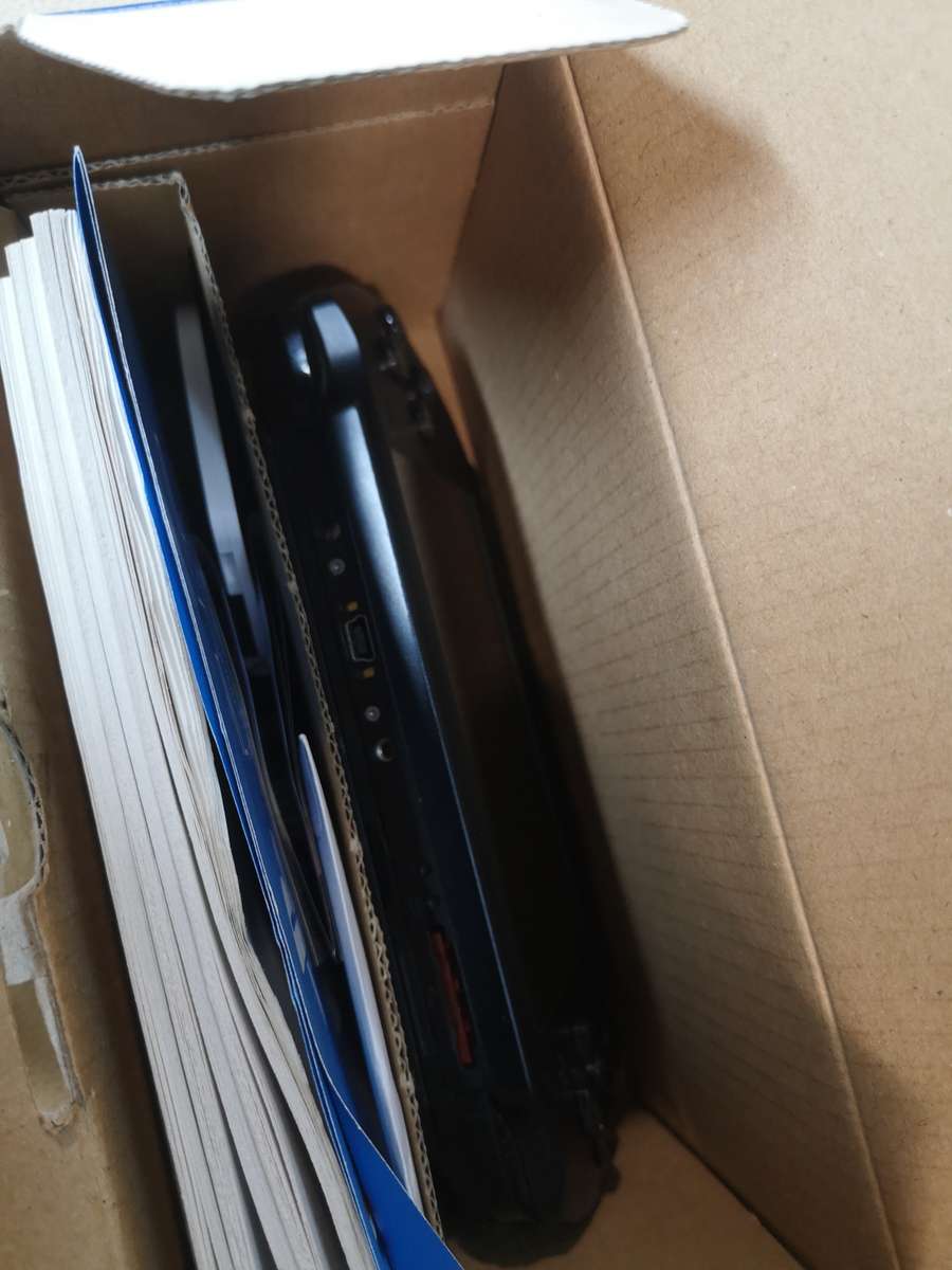 Sony psp sreet (Psp - E1004) charcoal black console with original packaging and games bundle