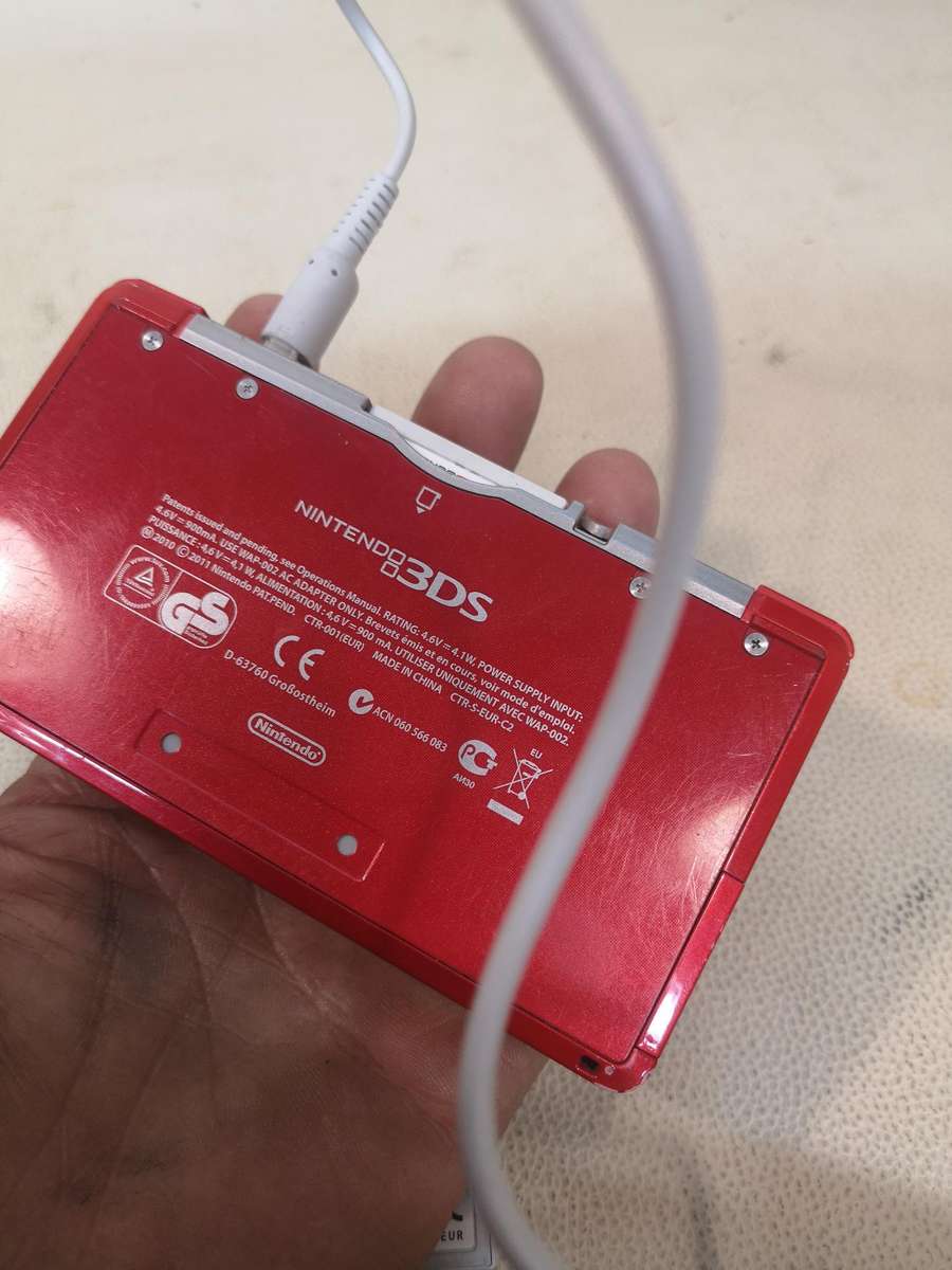 Nintendo 3DS Metallic Red Handheld Console with 5 Games & Charger