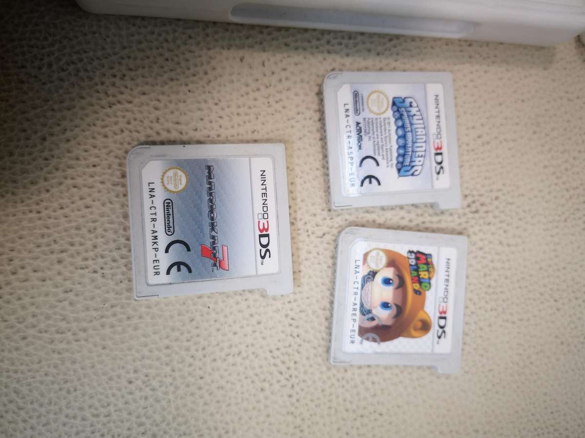 Nintendo 3DS Metallic Red Handheld Console with 5 Games & Charger