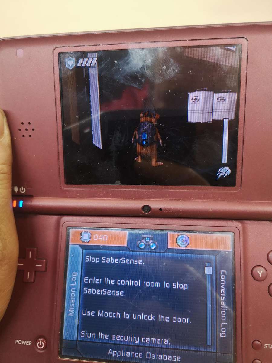 Nintendo DSi XL with 3 Games & Charger