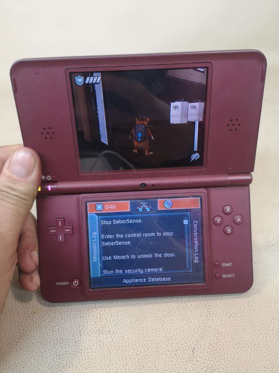 Nintendo DSi XL with 3 Games & Charger