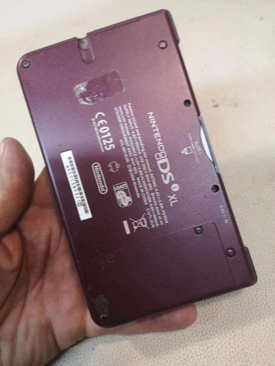 Nintendo DSi XL with 3 Games & Charger