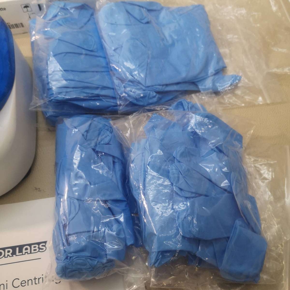 New Centrifuge Machine and Huge Bundle of Sealed Boxes of Medical Lab equipment