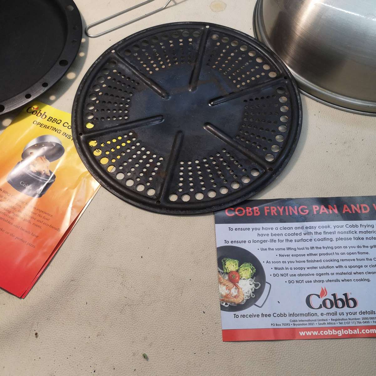 Cobb Portable Grill and a Frying Pan and Wok Set for the Grill
