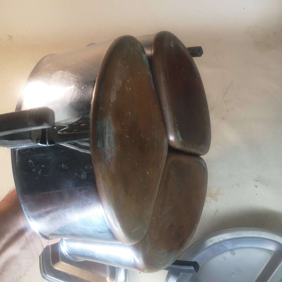 AN INCREDIBLE SET OF THREE VINTAGE COPPER BOTTOM POINTERWARE "TRIANGULAR" COOKING POTS