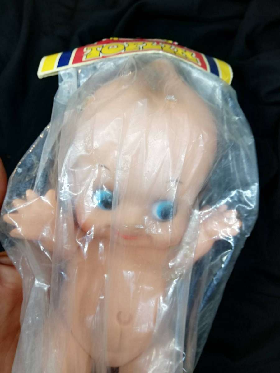 Vintage Kewpie baby doll Still Sealed in its Original Clear Packaging.