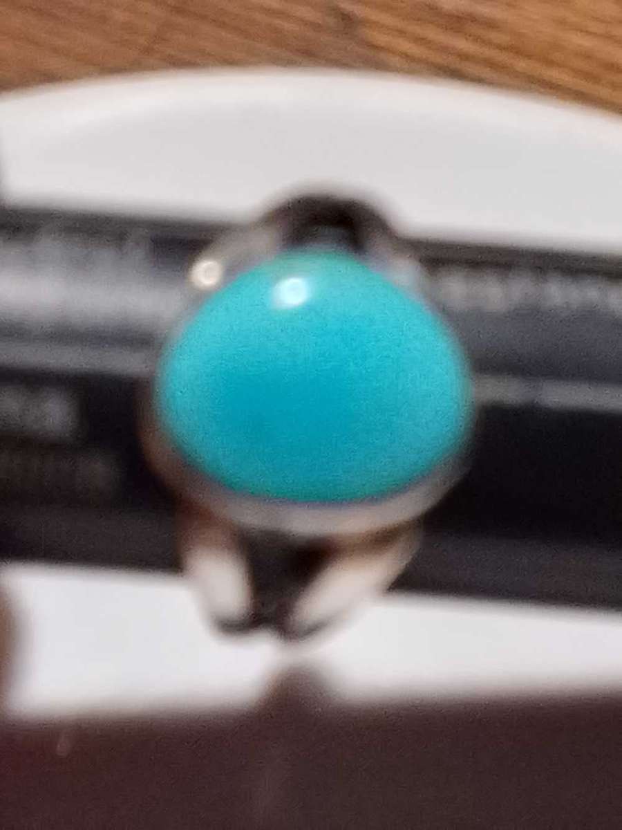 Sterling silver ring with blue stone