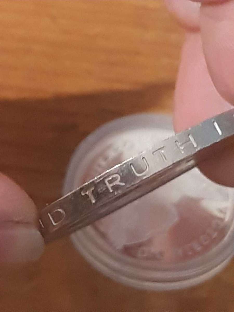 Elizabeth II commemorative 5 Shillings.