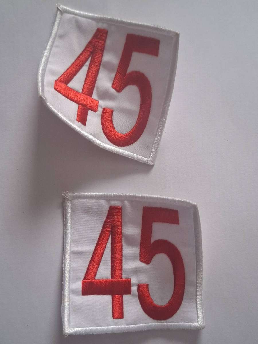 Lot I : Unused pair race age numbers - 45