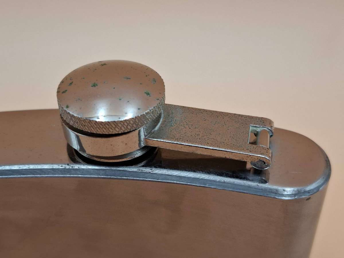 Vintage Stainless Steel Hip Flask - Curved Design with Screw-on Cap connected to Flask