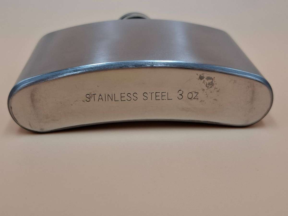 Vintage Stainless Steel Hip Flask - Curved Design with Screw-on Cap connected to Flask