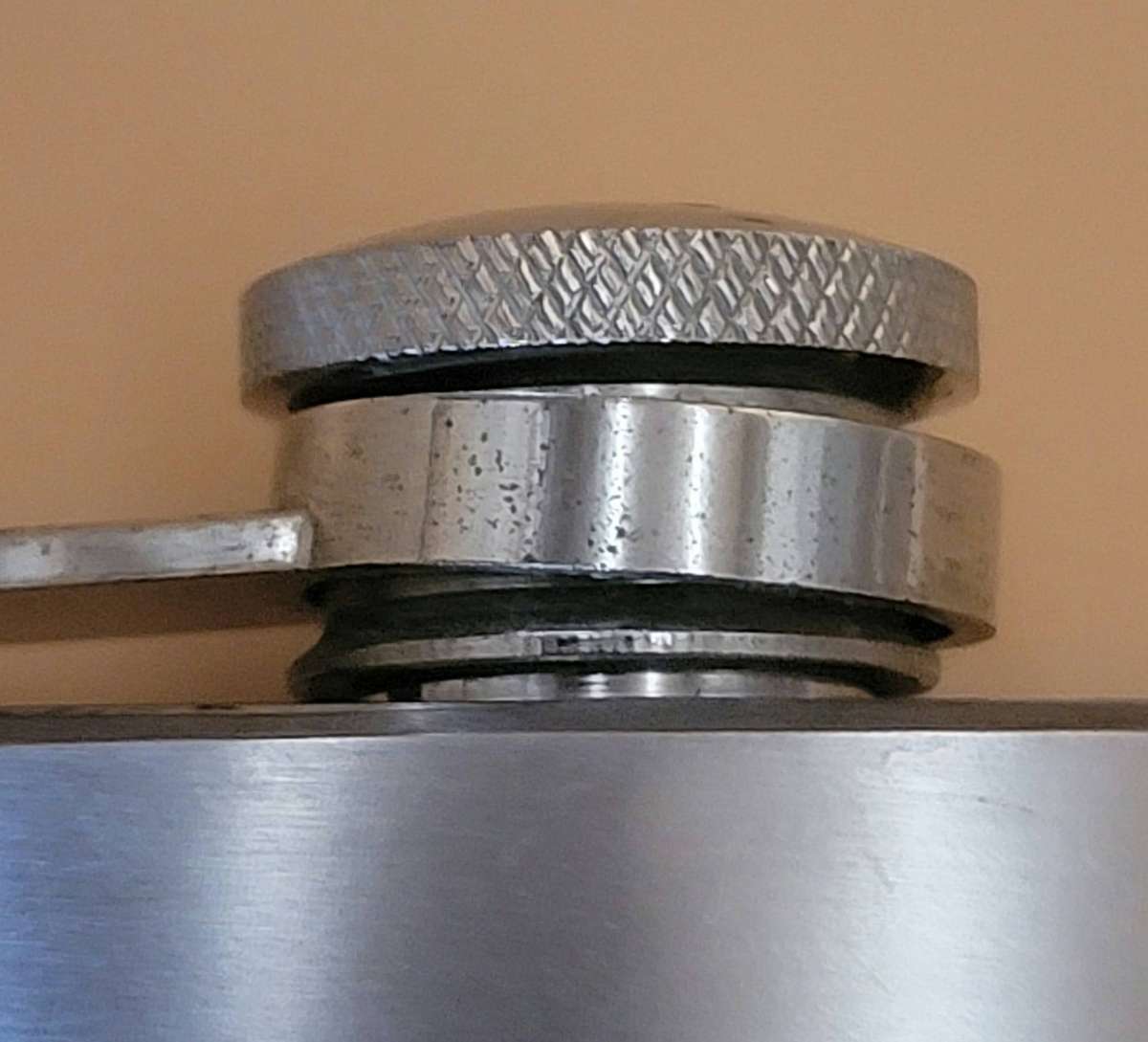 Vintage Stainless Steel Hip Flask - Curved Design with Screw-on Cap connected to Flask