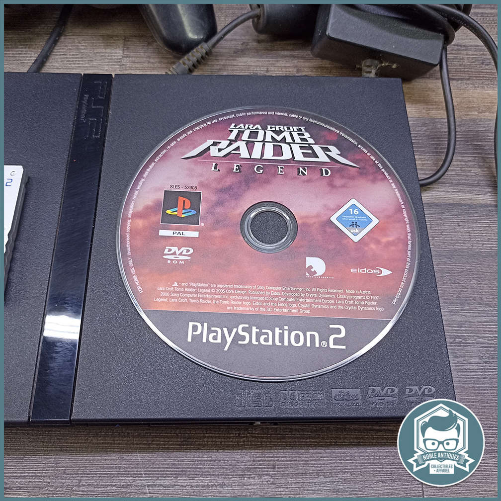 Working Sony PlayStation 2, Two Remotes, Cables and 1 Game!!!