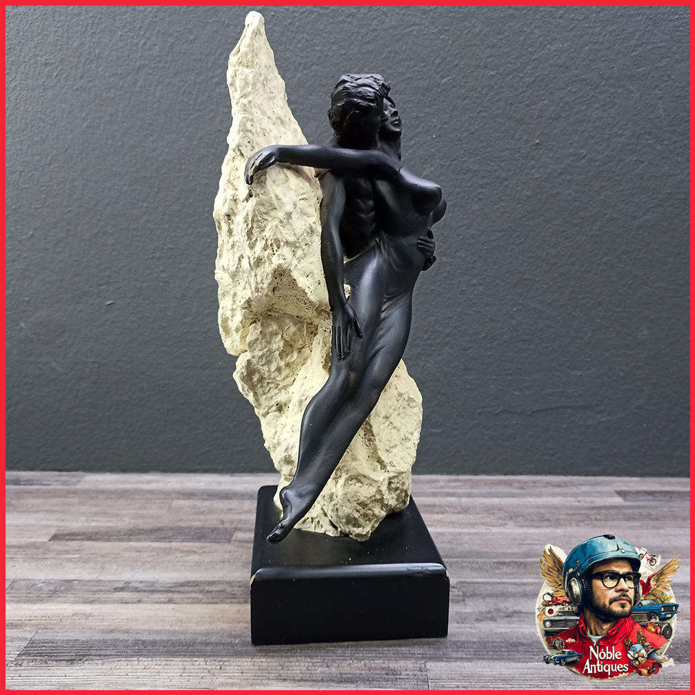 Stoneworks ocean lovers figurine made for regency fine arts