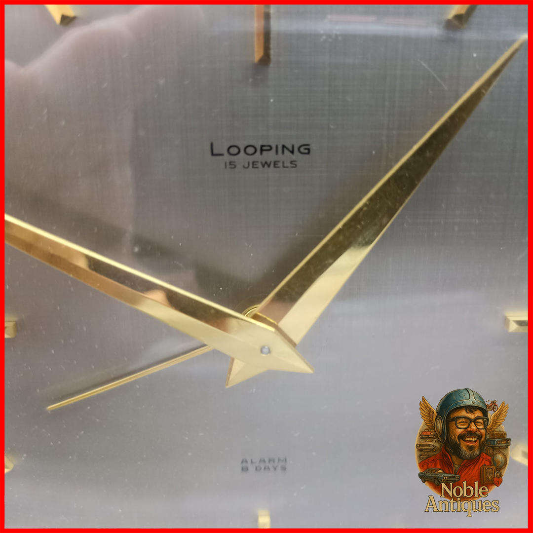 Swiss 15 Jewel Looping Clock, brass and Metal - Extremely Heavy