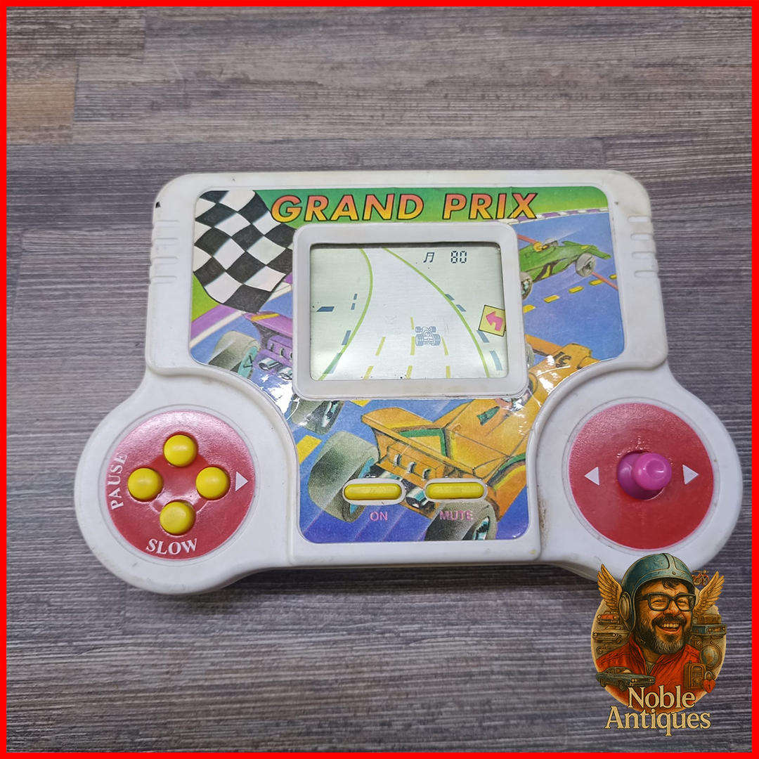 Working vintage Grand Prix handheld electronic racing game