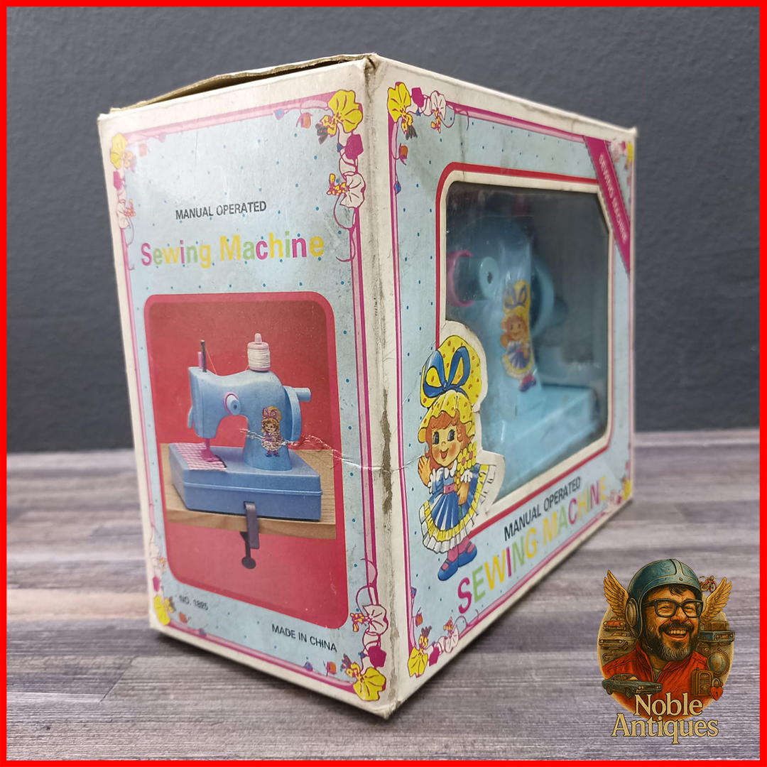 Vintage Boxed Little Miss Homemaker manual-operated toy sewing machine