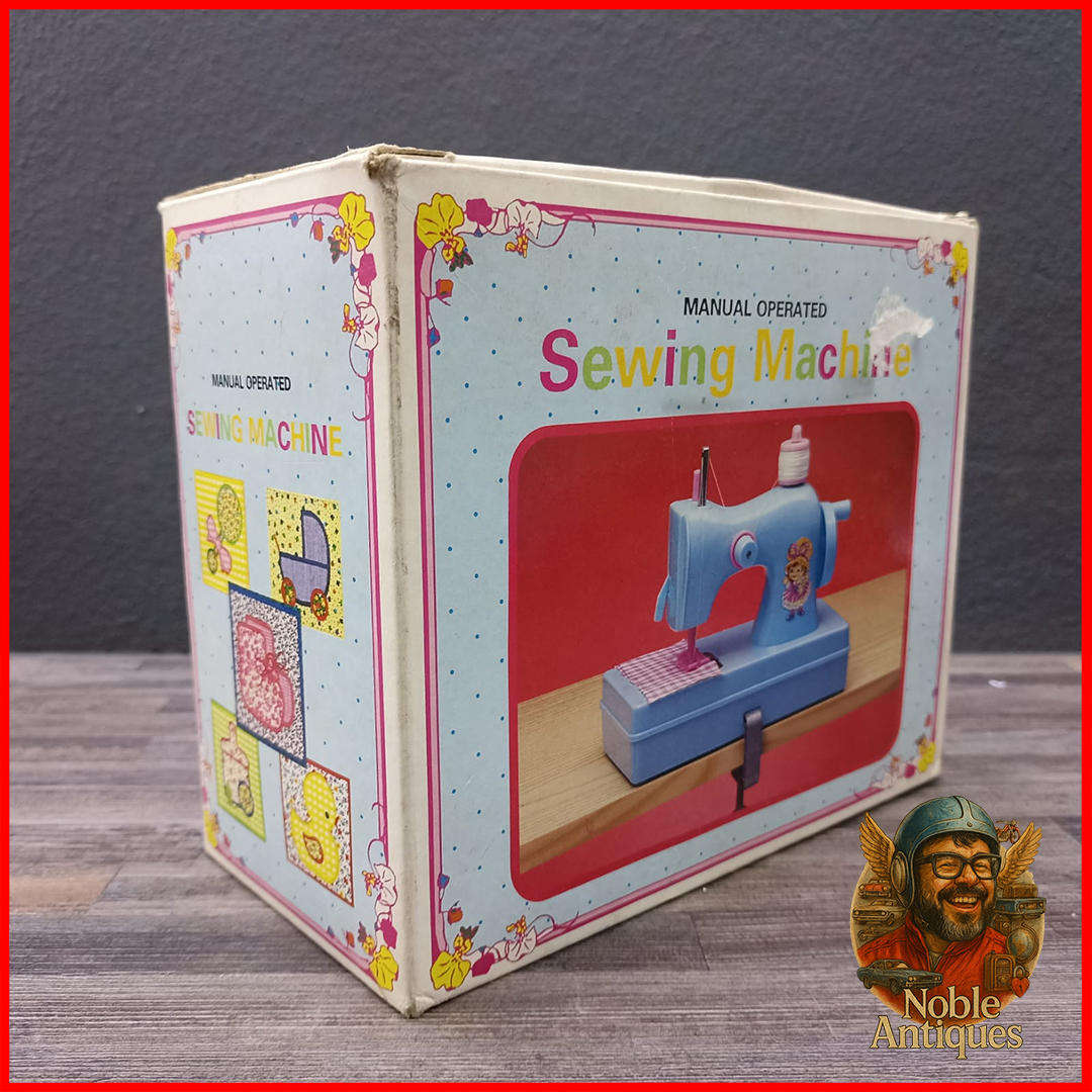 Vintage Boxed Little Miss Homemaker manual-operated toy sewing machine