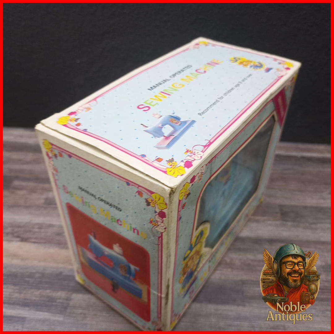 Vintage Boxed Little Miss Homemaker manual-operated toy sewing machine