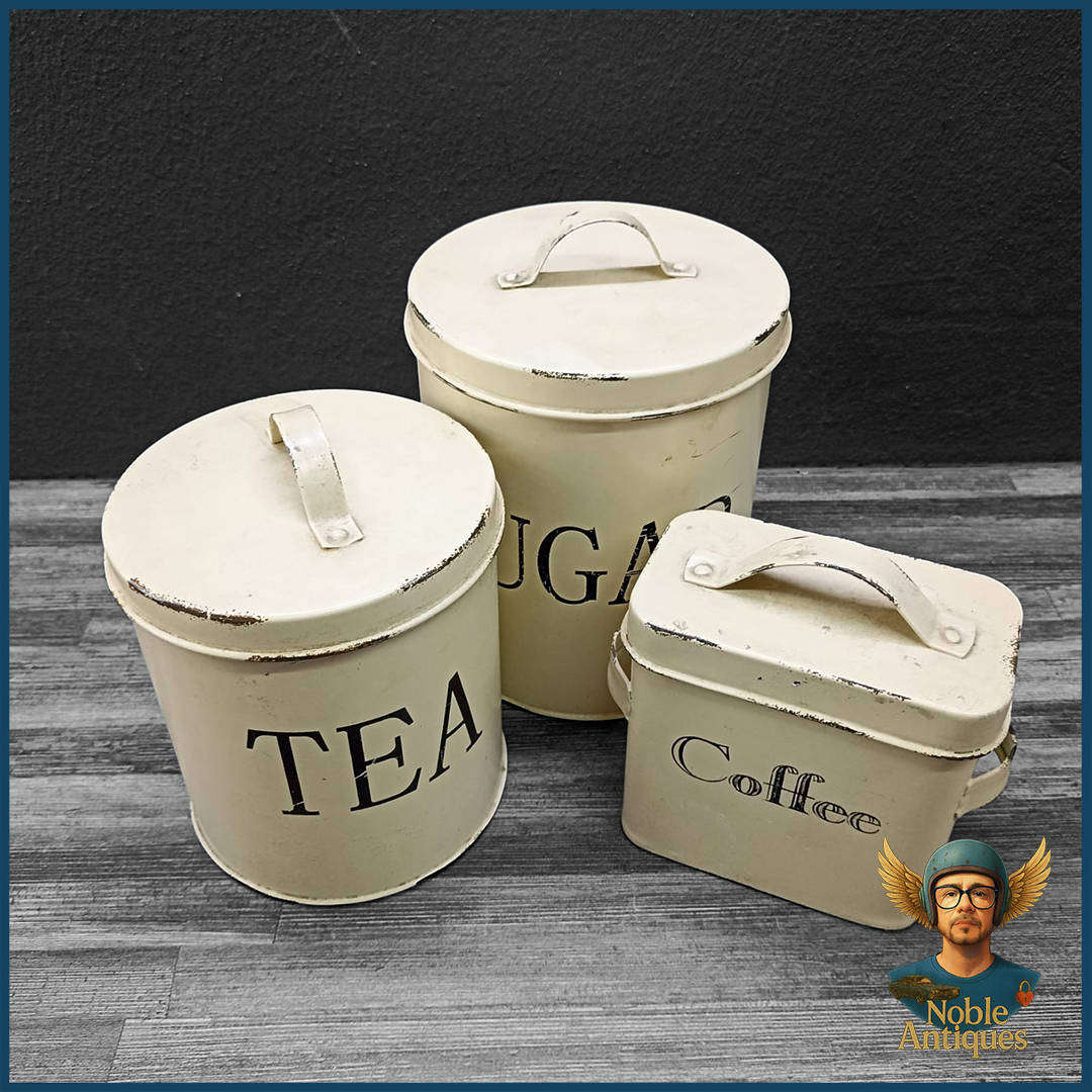 Three Vintage Metal Canisters For Storing Tea, Sugar, And Coffee