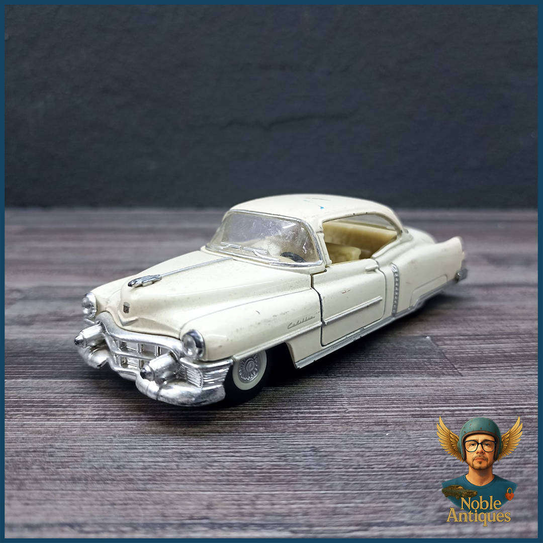 Kinsmart 1:43 scale die-cast model of a 1953 Cadillac Series 62 Coupe