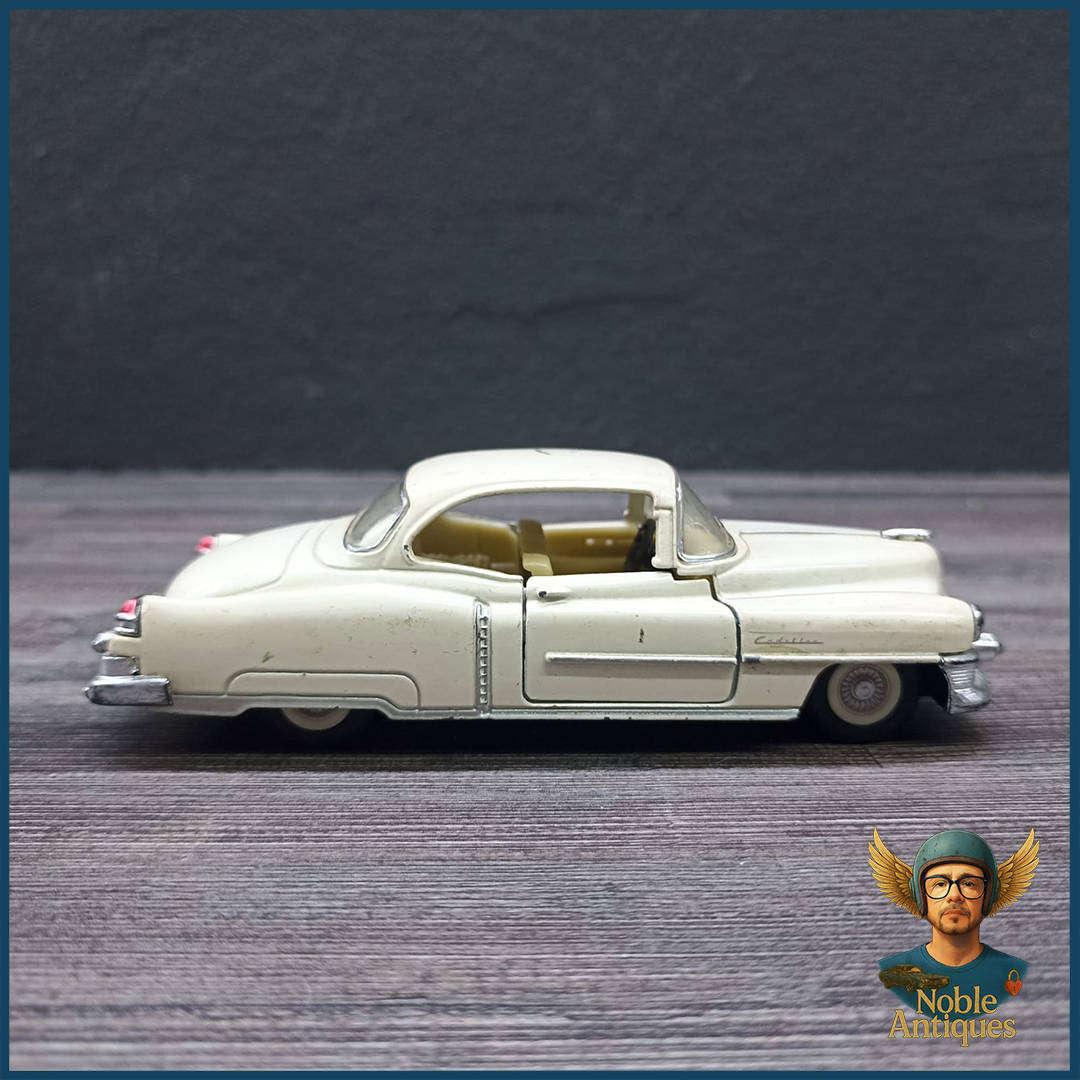 Kinsmart 1:43 scale die-cast model of a 1953 Cadillac Series 62 Coupe