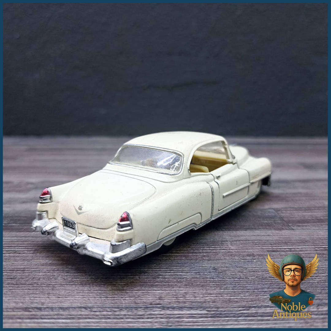 Kinsmart 1:43 scale die-cast model of a 1953 Cadillac Series 62 Coupe